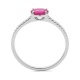 Anillo de oro blanco de 18 Kt con piedra de color y diamantes de 0,09 ct
