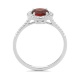 Anillo Rosetón de oro blanco de 18 Kt con piedra de color y diamantes de 0,12 ct