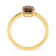 Anillo Rosetón de oro amarillo de 18 Kt con piedra de color y diamantes de 0,05 ct