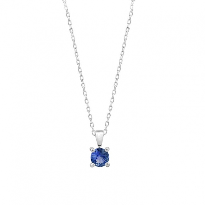 Colgante Solitario de oro blanco de 18 Kt con piedra de color
