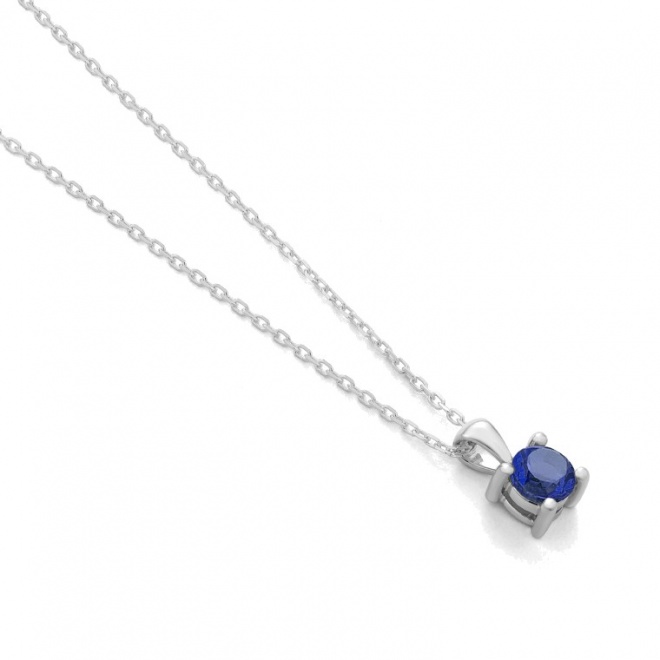 Colgante Solitario de oro blanco de 18 Kt con piedra de color