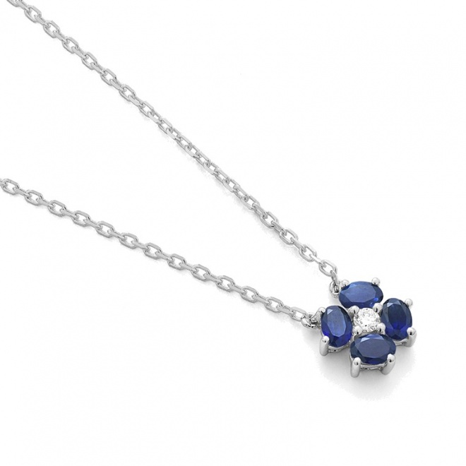 Colgante de oro blanco de 18 Kt con zafiro azul de 0,35 ct y diamante de 0,03 ct