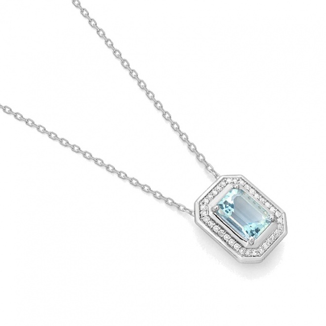 Colgante de oro blanco de 18 Kt con piedra de color y diamantes de 0,10 ct