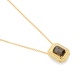 Colgante de oro amarillo de 18 Kt con piedra de color y diamantes de 0,10 ct
