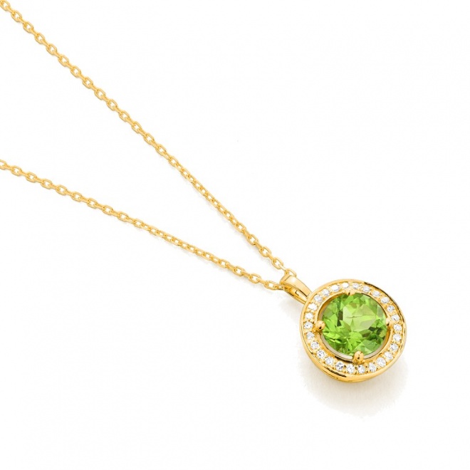 Colgante Rosetón de oro amarillo de 18 Kt con piedra de color y diamantes de 0,07 ct