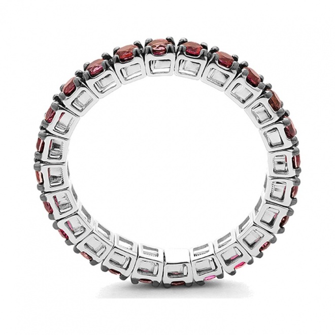 Anillo Alianza de oro blanco de 18 Kt con topacio de 0,95 ct