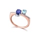 Anillo de oro blanco y rosa de 18 Kt con diamantes, zafiro y aguamarina, 0,06 ct