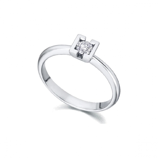 Anillo de oro blanco de 18 Kt con diamante de 0,18 ct