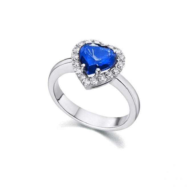 Anillo de oro blanco de 18 Kt con zafiro y orla de diamantes, 0,24 ct