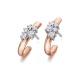 Pendientes de oro blanco y rosa de 18 Kt con diamantes de 0,39 ct