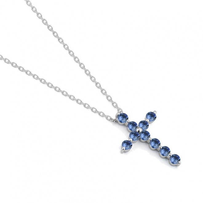 Colgante Cruz de oro blanco de 18 Kt con zafiro azul de 0,53 ct