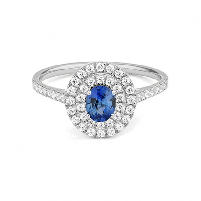 Anillo de oro blanco de 18 Kt con zafiro azul y diamantes