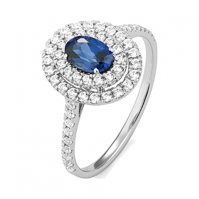 Anillo de oro blanco de 18 Kt con zafiro azul y diamantes