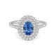 Anillo de oro blanco de 18 Kt con zafiro azul y diamantes