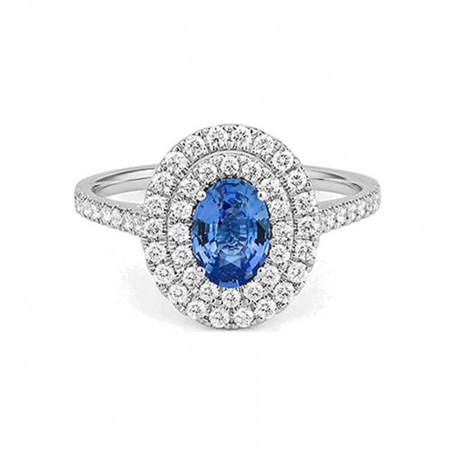Anillo de oro blanco de 18 Kt con zafiro azul y diamantes