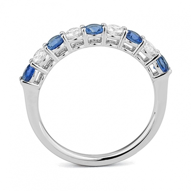 Anillo Media alianza de oro blanco de 18 Kt con zafiro azul de 0,53 ct y diamantes de 0,38 ct