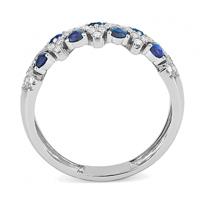 Anillo de oro blanco de 18 Kt con zafiro azul de 0,38 ct y diamantes de 0,25 ct