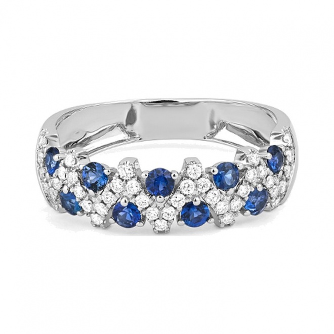 Anillo de oro blanco de 18 Kt con zafiro azul de 0,38 ct y diamantes de 0,25 ct