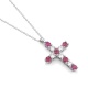 Colgante Cruz de oro blanco de 18 Kt con rubíes de 0,64 ct y diamantes de 0,47 ct