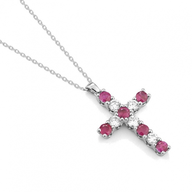 Colgante Cruz de oro blanco de 18 Kt con rubíes de 0,64 ct y diamantes de 0,47 ct