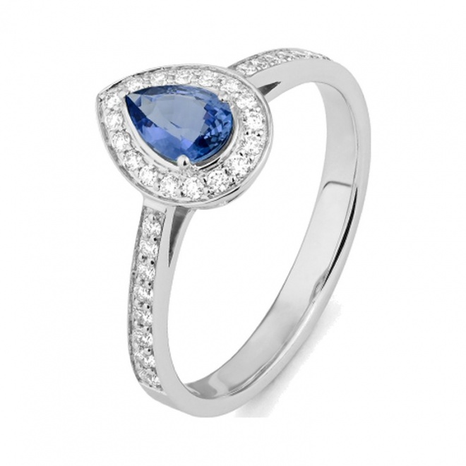 Anillo de oro blanco de 18 Kt con zafiro azul y diamantes