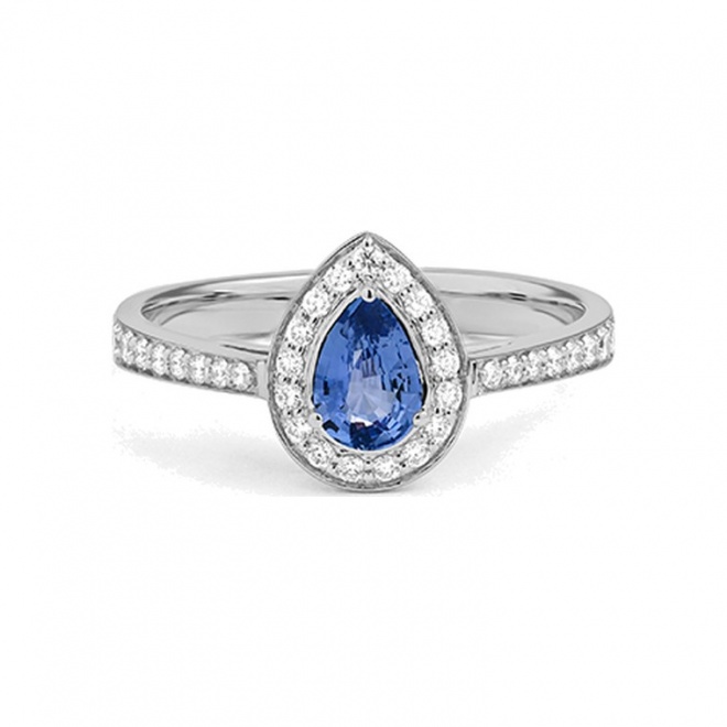 Anillo de oro blanco de 18 Kt con zafiro azul y diamantes