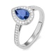 Anillo de oro blanco de 18 Kt con zafiro azul y diamantes