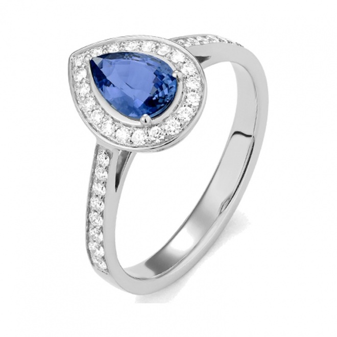 Anillo de oro blanco de 18 Kt con zafiro azul y diamantes