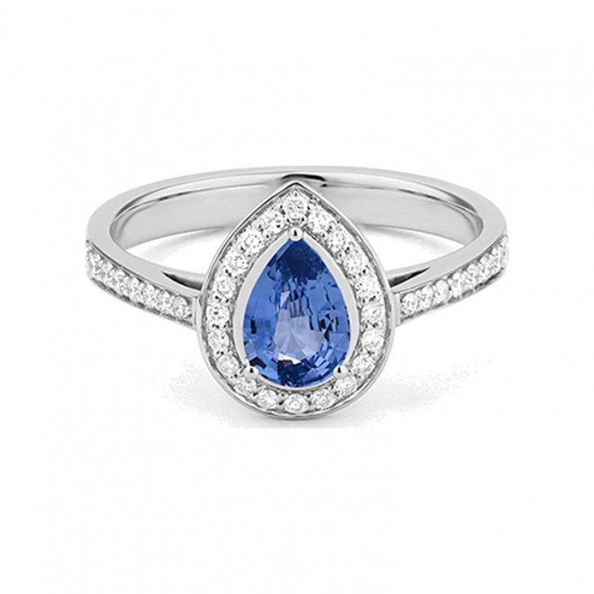 Anillo de oro blanco de 18 Kt con zafiro azul y diamantes