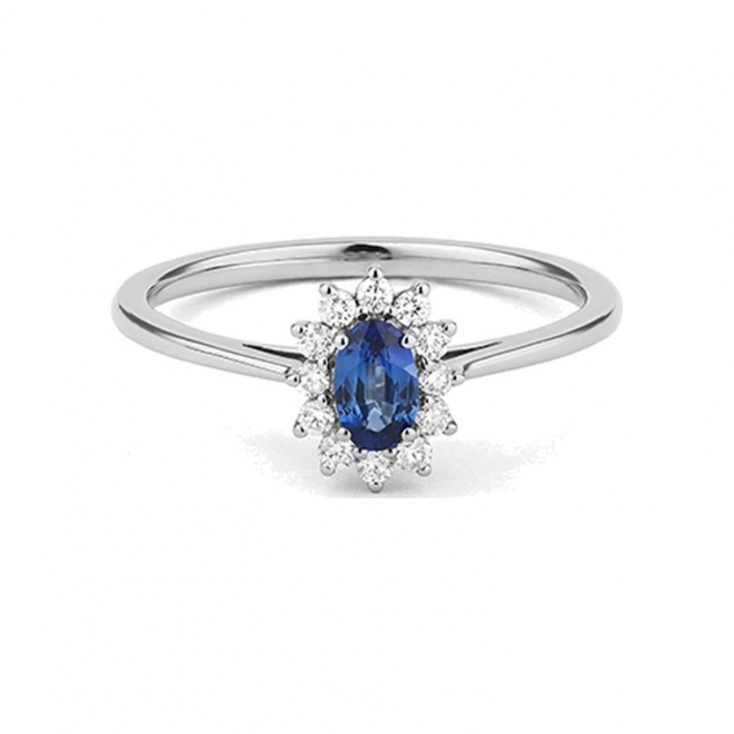Anillo de oro blanco de 18 Kt con zafiro azul y diamantes