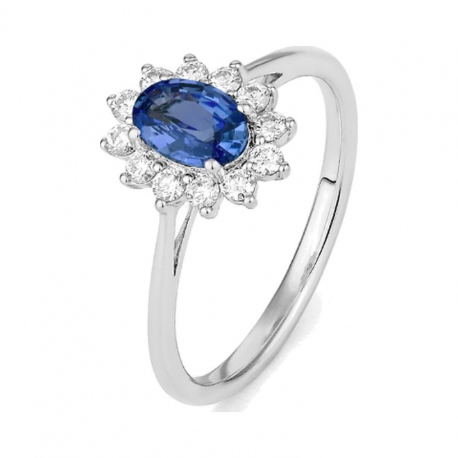 Anillo de oro blanco de 18 Kt con zafiro azul y diamantes