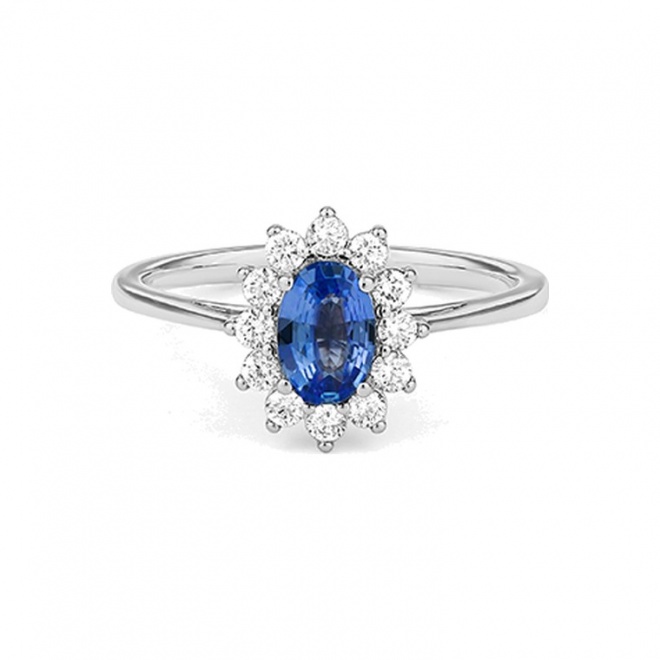 Anillo de oro blanco de 18 Kt con zafiro azul y diamantes