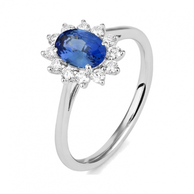 Anillo de oro blanco de 18 Kt con zafiro azul y diamantes