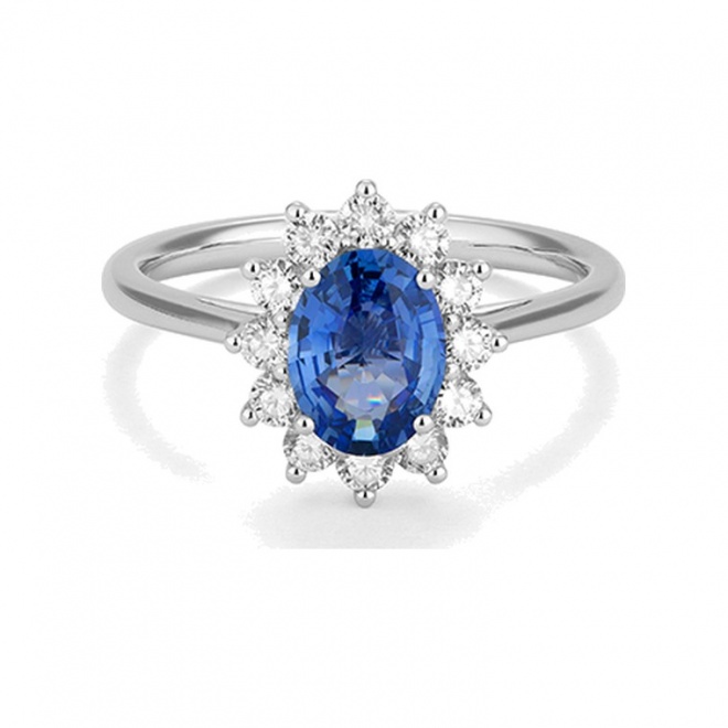 Anillo de oro blanco de 18 Kt con zafiro azul y diamantes