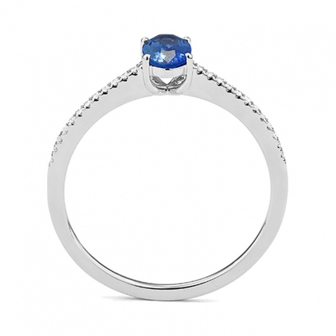 Anillo de oro blanco de 18 Kt con zafiro azul y diamantes de 0,07 ct