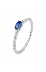 Anillo de oro blanco de 18 Kt con zafiro azul y diamantes de 0,06 ct