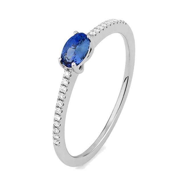 Anillo de oro blanco de 18 Kt con zafiro azul y diamantes de 0,06 ct