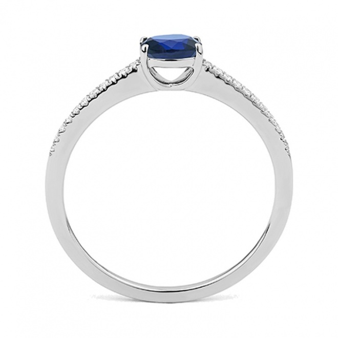 Anillo de oro blanco de 18 Kt con zafiro azul y diamantes de 0,06 ct