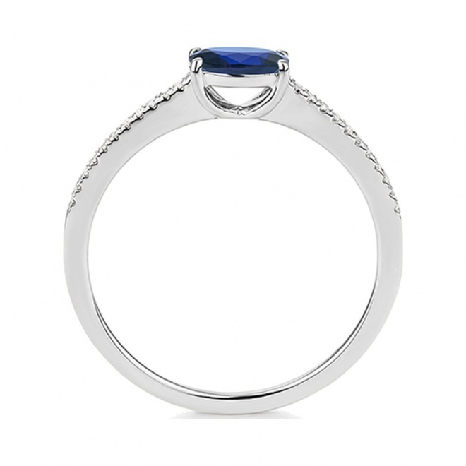 Anillo de oro blanco de 18 Kt con zafiro azul y diamantes de 0,06 ct
