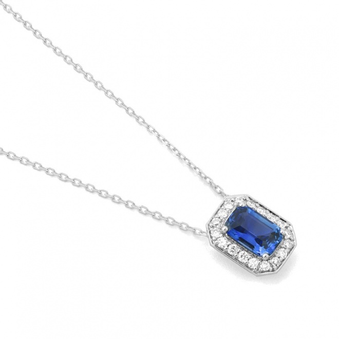 Colgante de oro blanco de 18 Kt con zafiro azul y diamantes