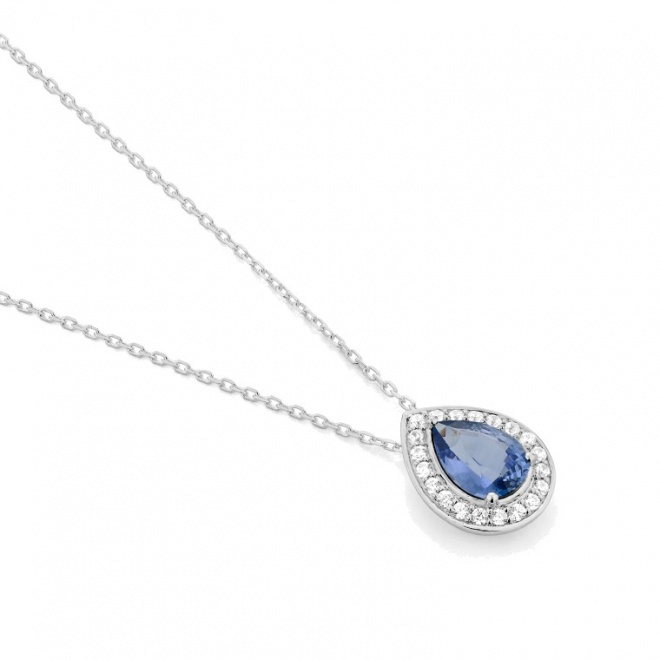 Colgante de oro blanco de 18 Kt con zafiro azul y diamantes