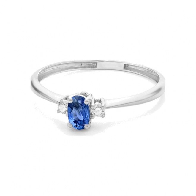 Anillo de oro blanco de 18 Kt con zafiro azul de 0,30 ct y diamantes de 0,05 ct