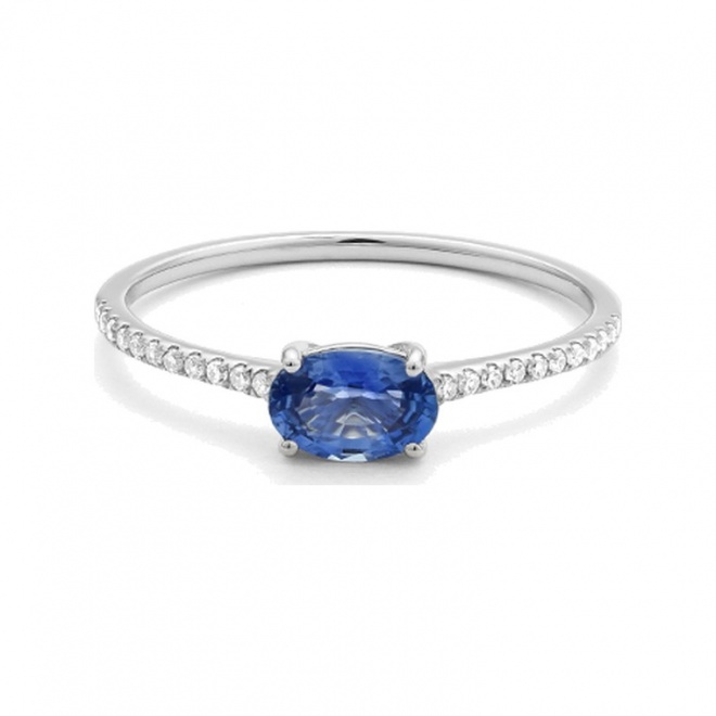 Anillo de oro blanco de 18 Kt con zafiro azul de 0,65 ct y diamantes de 0,09 ct