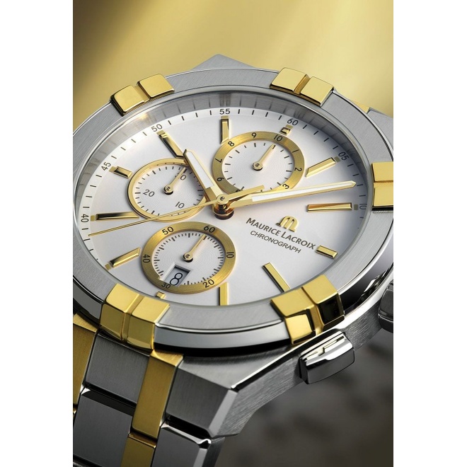 Maurice Lacroix Aikon Quartz Chronograph ∅42 mm - 10 ATM, Esfera blanca, brazalete de bicolor PVD oro amarilo, duotone - 10 ATM