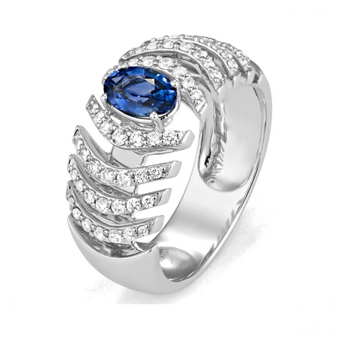 Anillo de oro blanco de 18 Kt con zafiro azul y diamantes