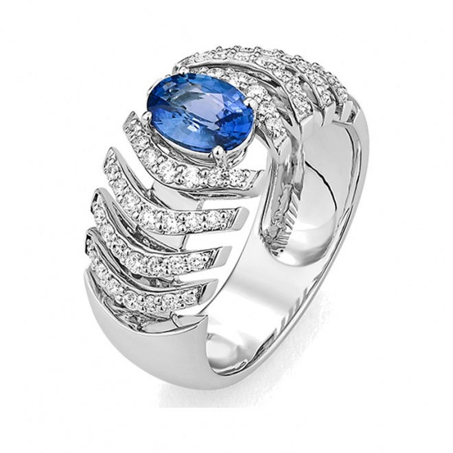Anillo de oro blanco de 18 Kt con zafiro azul y diamantes
