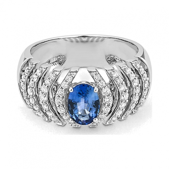 Anillo de oro blanco de 18 Kt con zafiro azul y diamantes