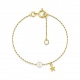 Pulsera infantil de oro amarillo con perla, estrella