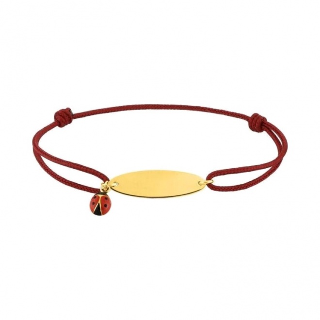 Pulsera infantil con placa de oro amarillo y cordón rojo, mariquita esmaltada