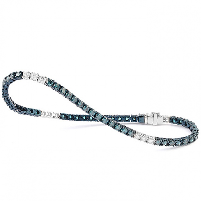 Pulsera rivière de oro blanco de 18K con zafiros azules y diamantes en talla brillante de 0,56 cts